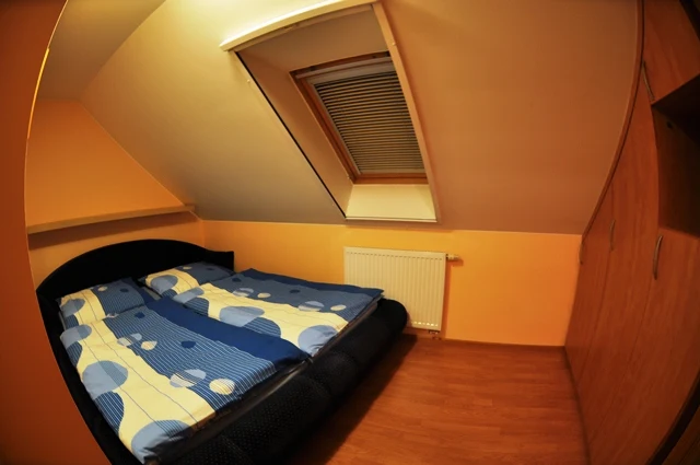 Dvoulůžkový pokoj v podkroví penzionu